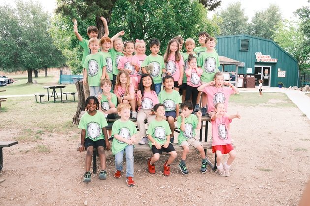 Selwyn students in matching spirit shirts gathered together outside on campus